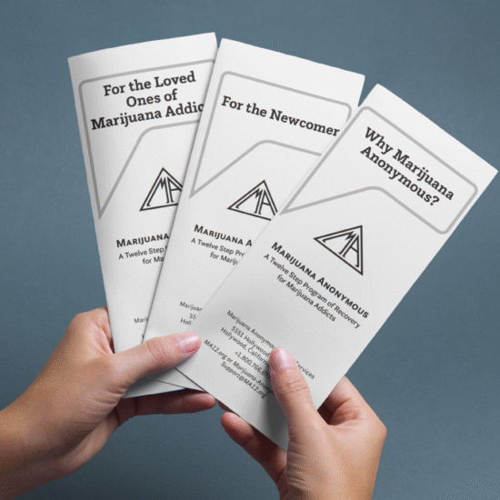 hands holding brochures
