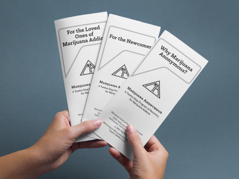 hands holding brochures