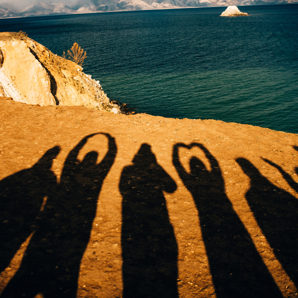 the shadows of multiple people