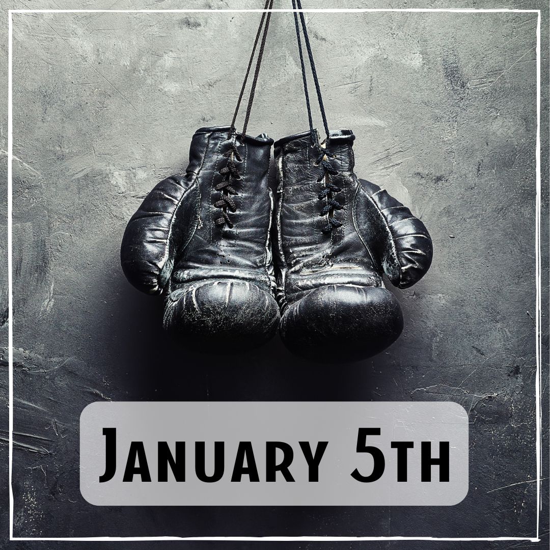 January 5th - a black and white photo of boxing gloves hanging on the wall