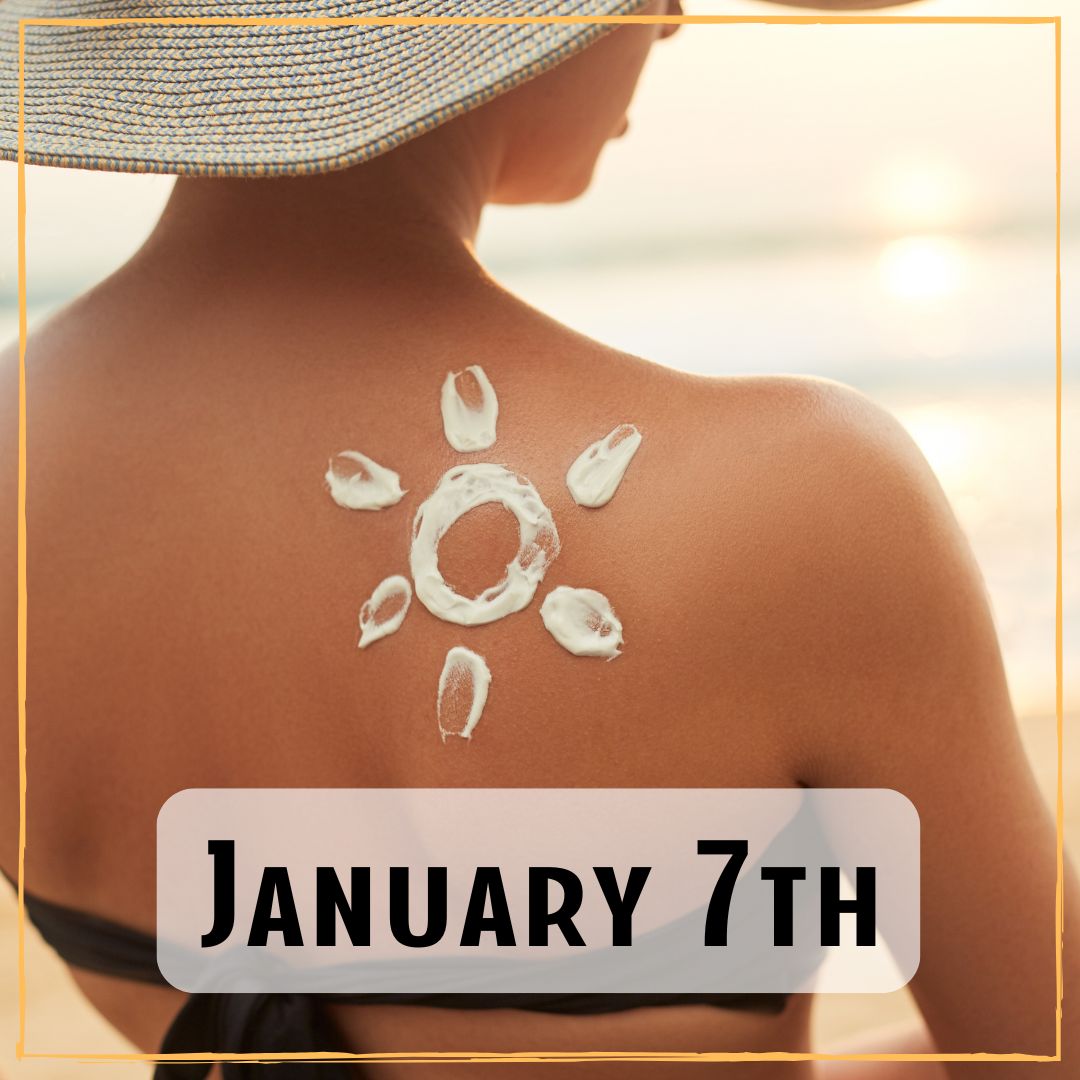 January 7th - at the beach, a person's back with sunscreen drawn in the shape of a sun