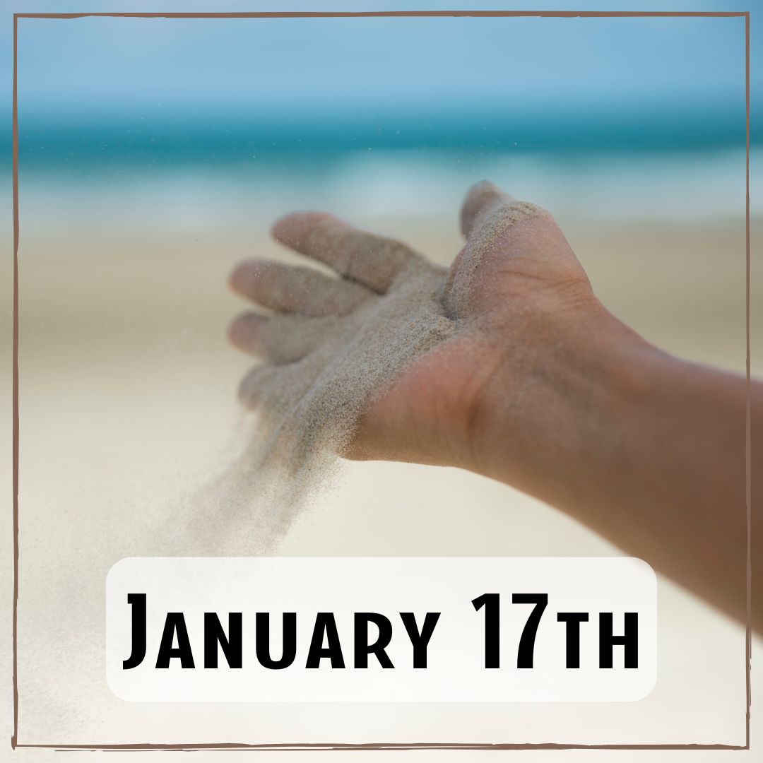 January 17th - at the beach, a hand with sand falling through the fingers