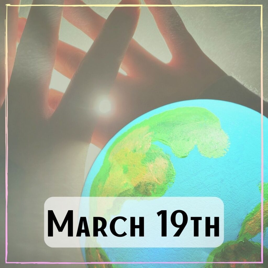 March 19th - a light-up globe with hands around it