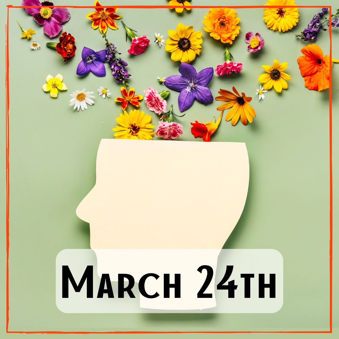 March 24th - a wooden shaped head, with multi-colored dried flowers coming out of the top of the head shape