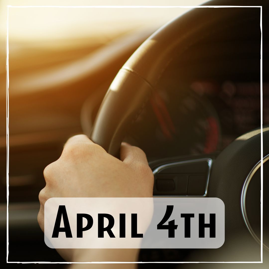 April 4th - a hand holding a car steering wheel