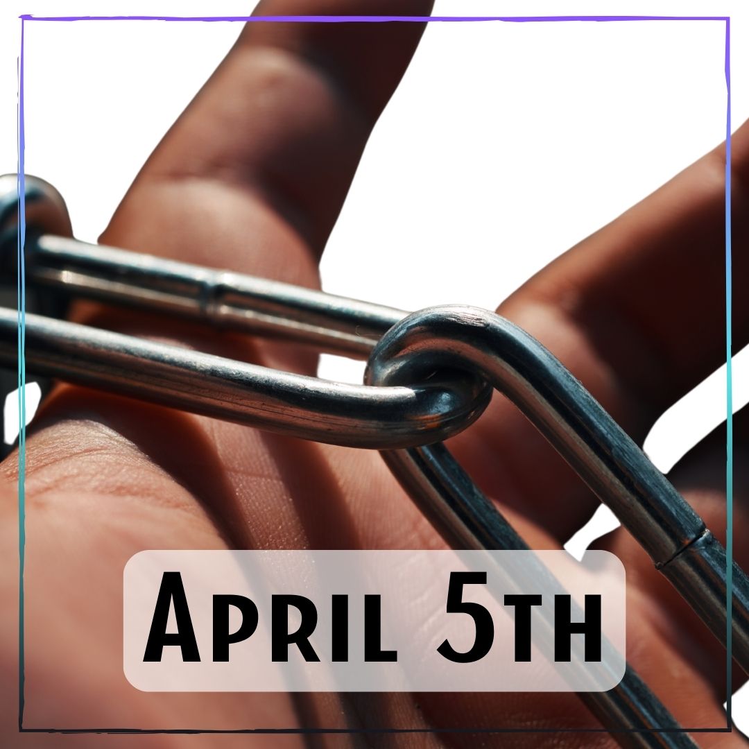 April 5th - a hand holding metal chains