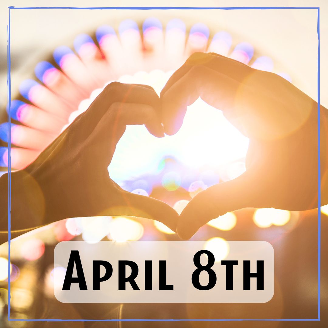 April 8th - a ferris wheel and the sunlight streaming through a person's hand making a heart shape