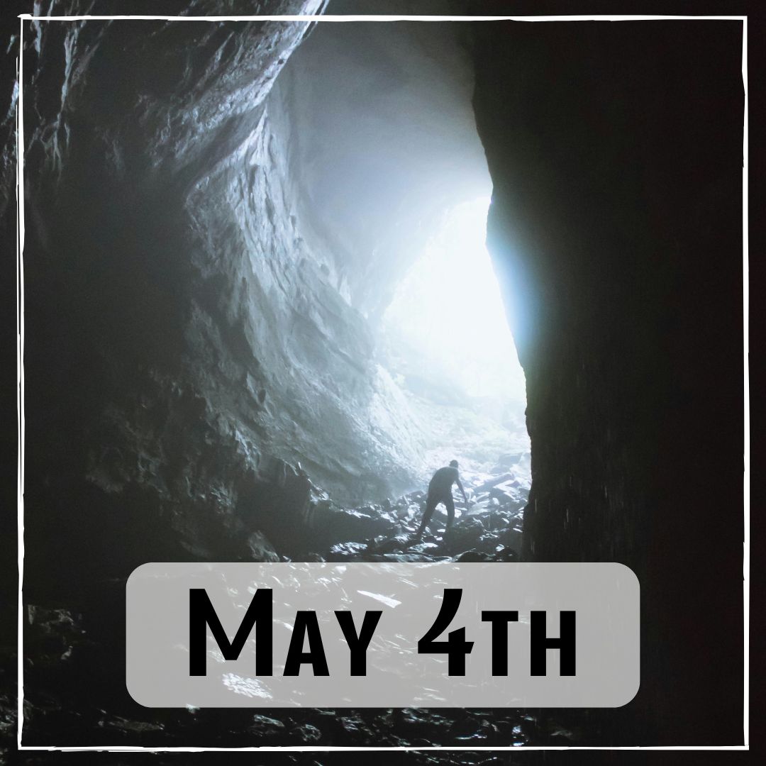 May 4th - a person walking out of a cave