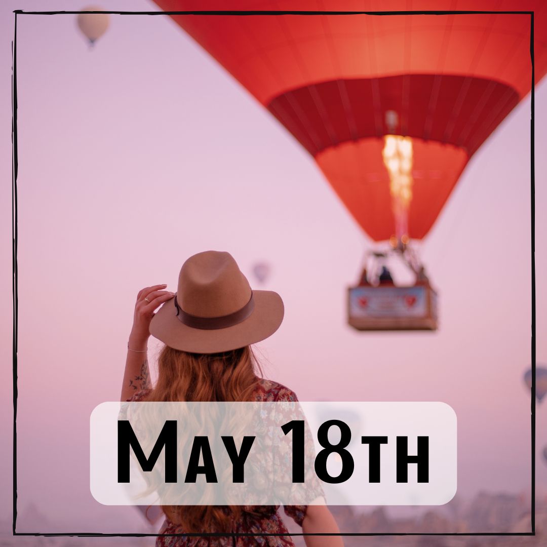 May 18th - a person looking at a hot air balloon