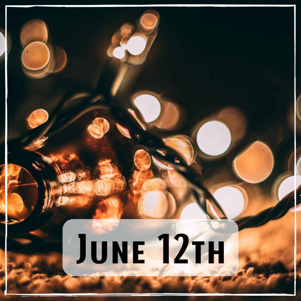 June 12th - a blurry image of a string of lights