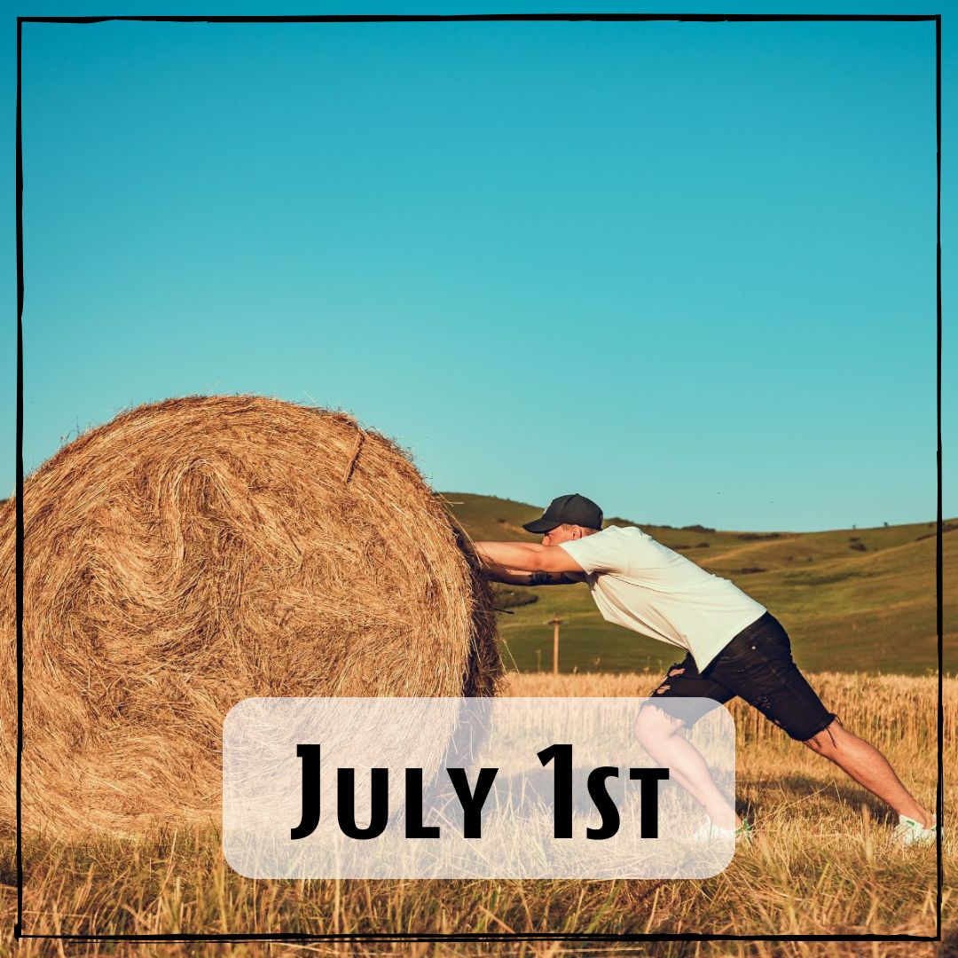 June 1st - a person pushing a large bale of hay