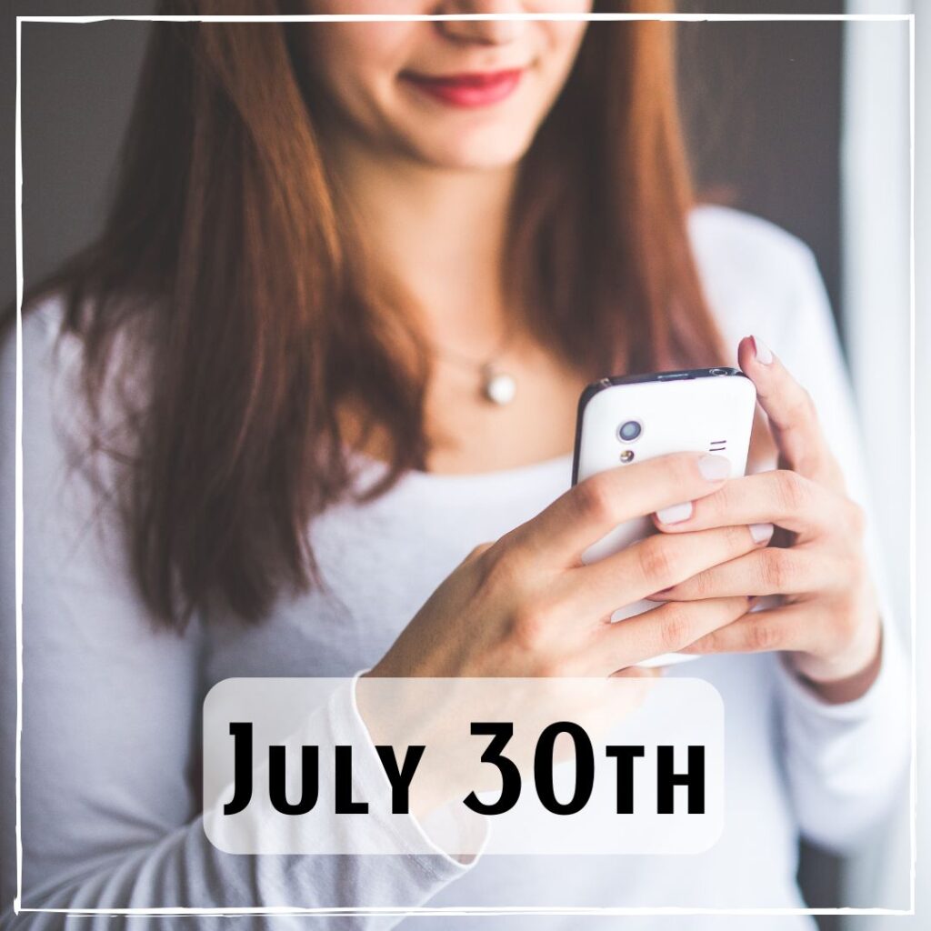 July 30th - a smiling person looking at their phone