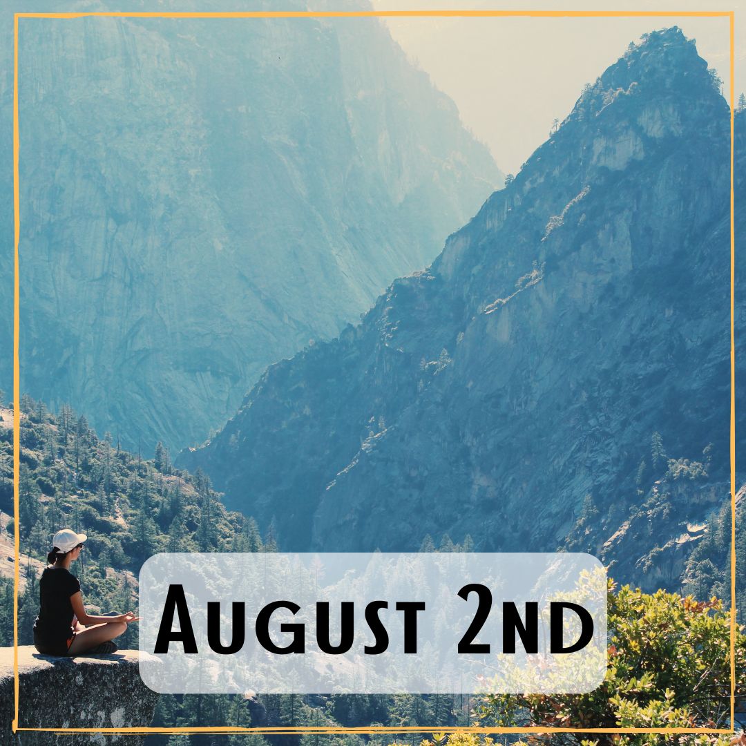August 2nd - a person looking out at a very tall mountainscape