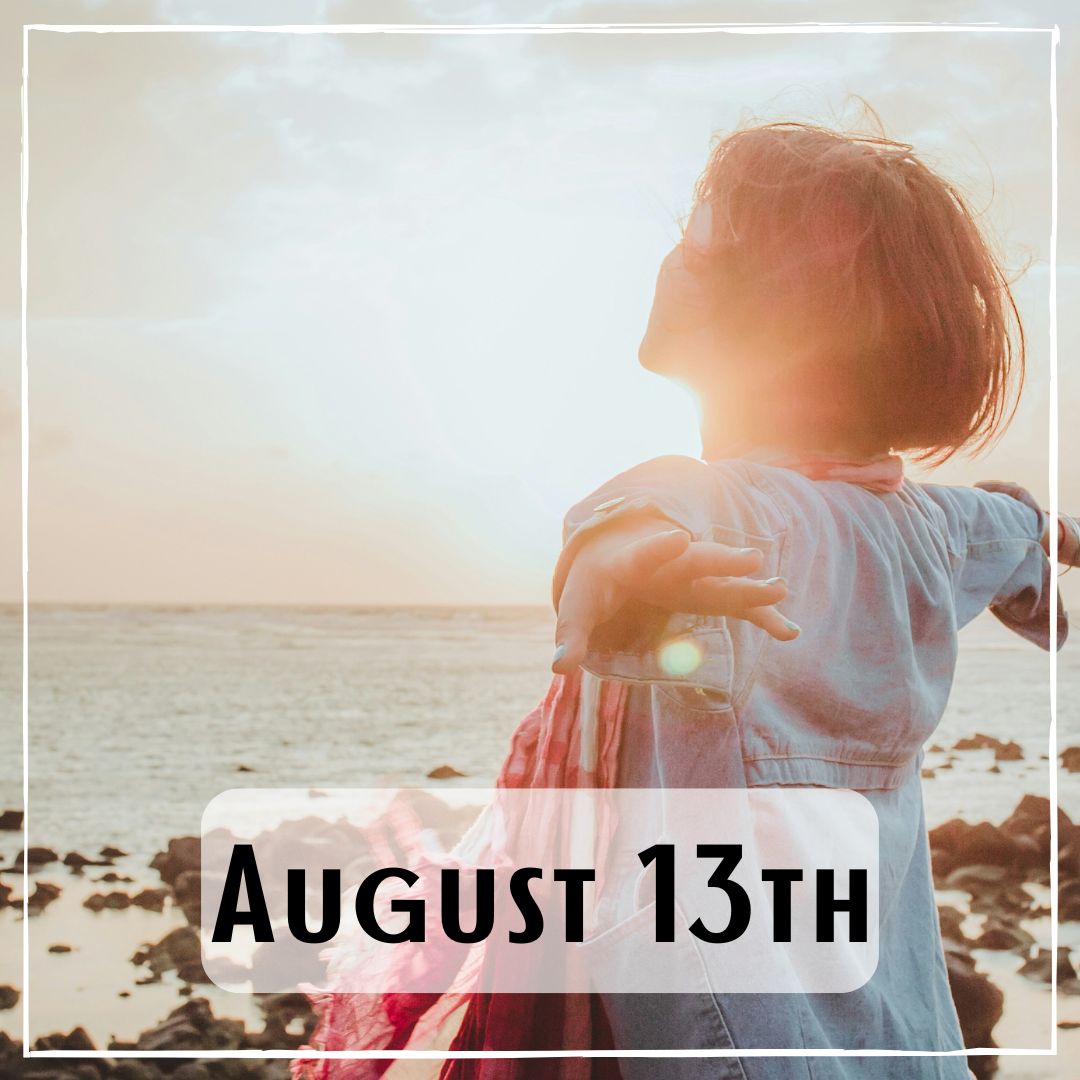 August 13th - a person with their arms outstretched with a sunrise background