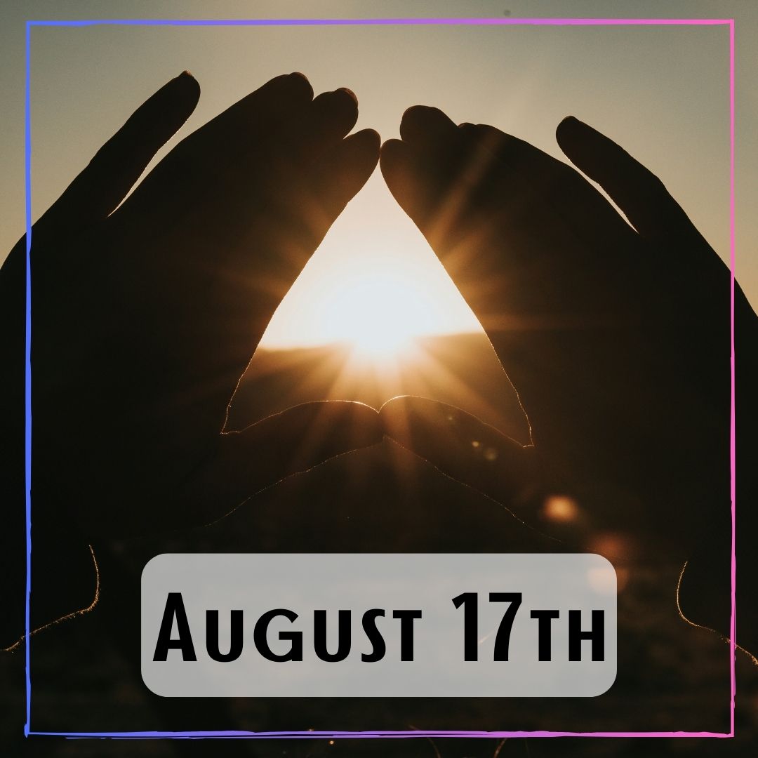 August 17th - a person holding their hands up in a triangle shape with the sunrise between the space in their hands