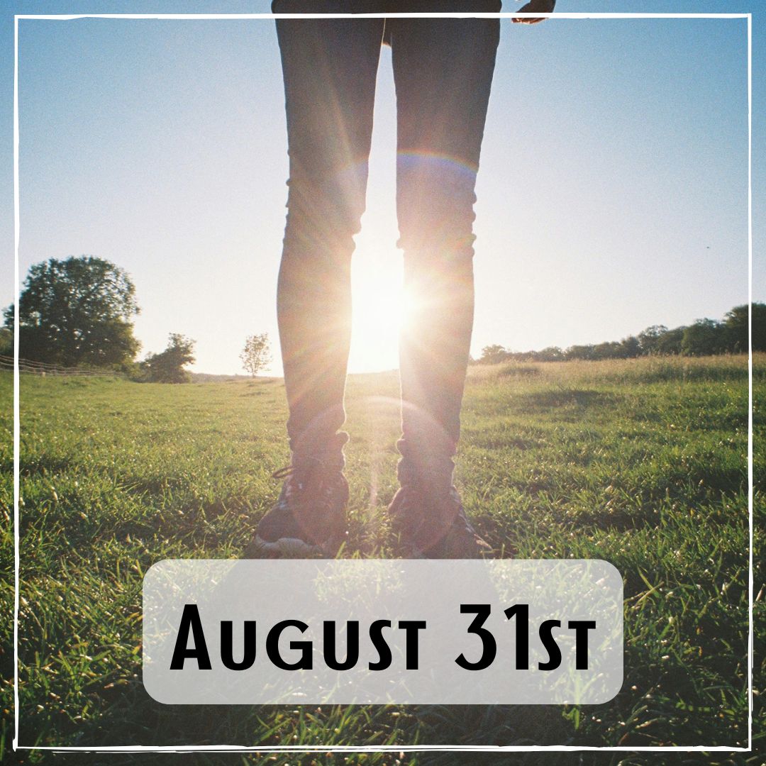 August 31st - a person standing in a field at sunrise