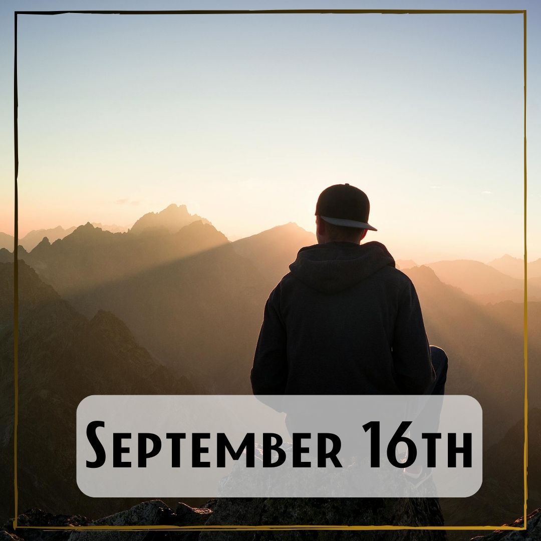 September 16th - a person looking out at sunrise over the mountains