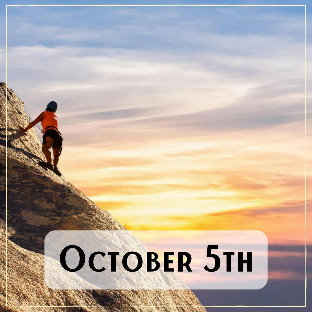 October 5th - a person rock climbing at sunrise