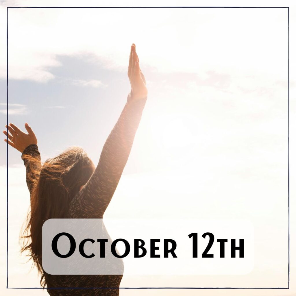 October 12th - a person with the arms outstreached at sunrise