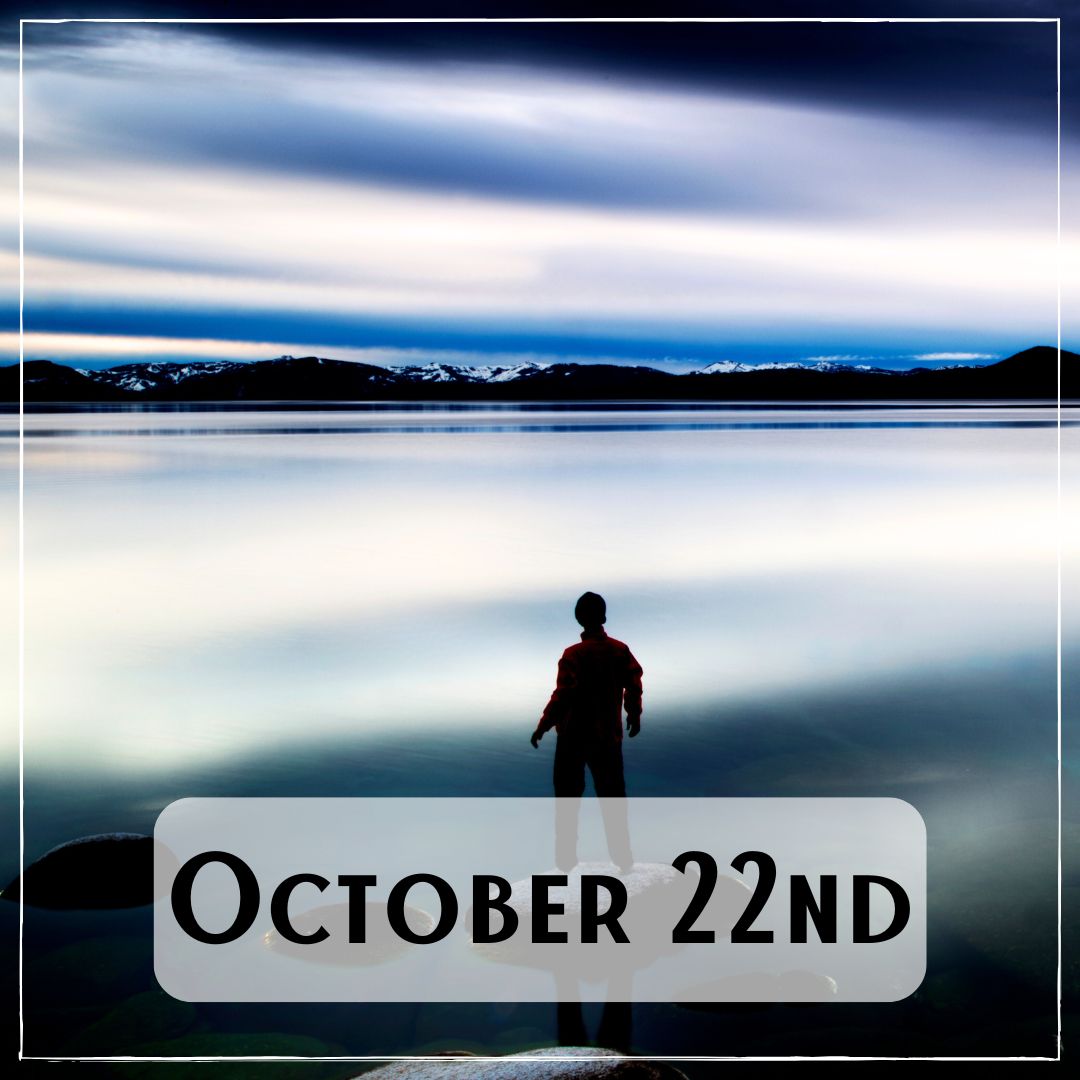 October 22nd - a person looking out to the reflective ocean at dawn