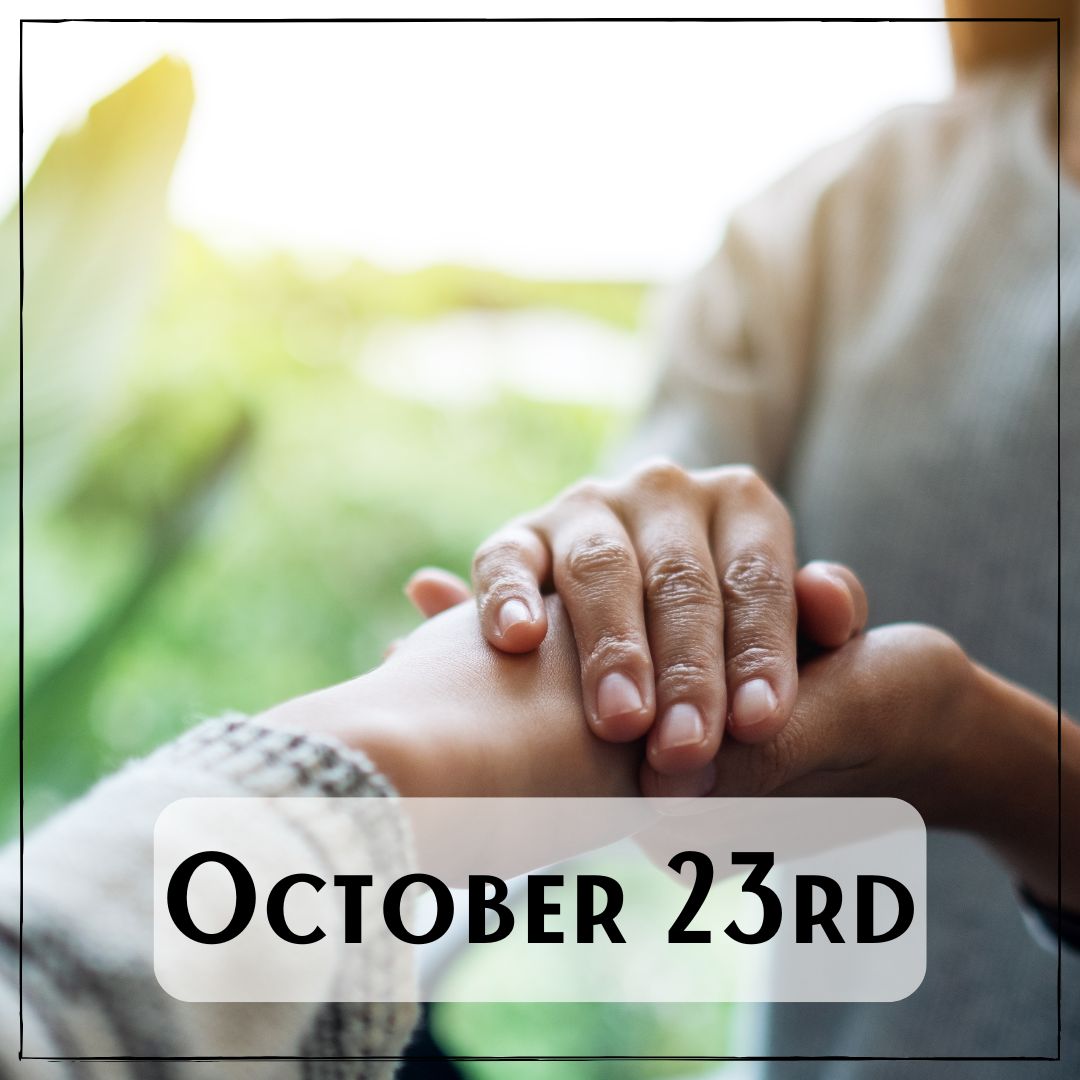 October 23rd - a person with their hand holding another person's hand