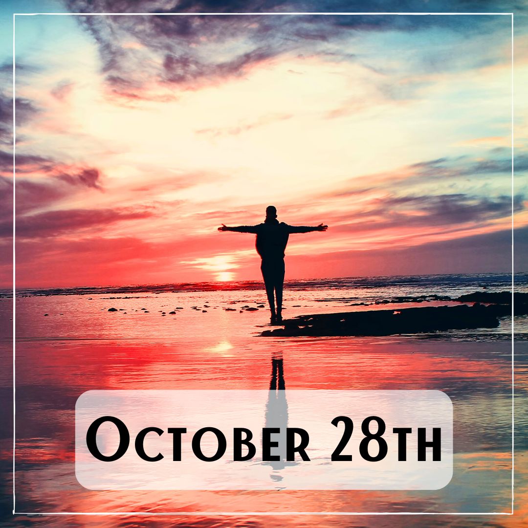 October 28th - a person standing on a sand bar with beautiful reflections from a sunset