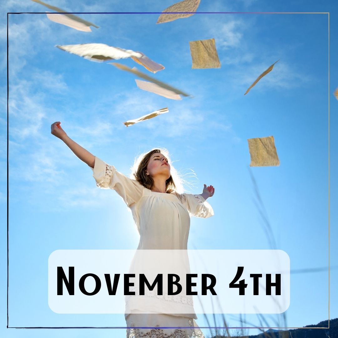 November 4th - a person who threw papers up in the air with sunlight behind them