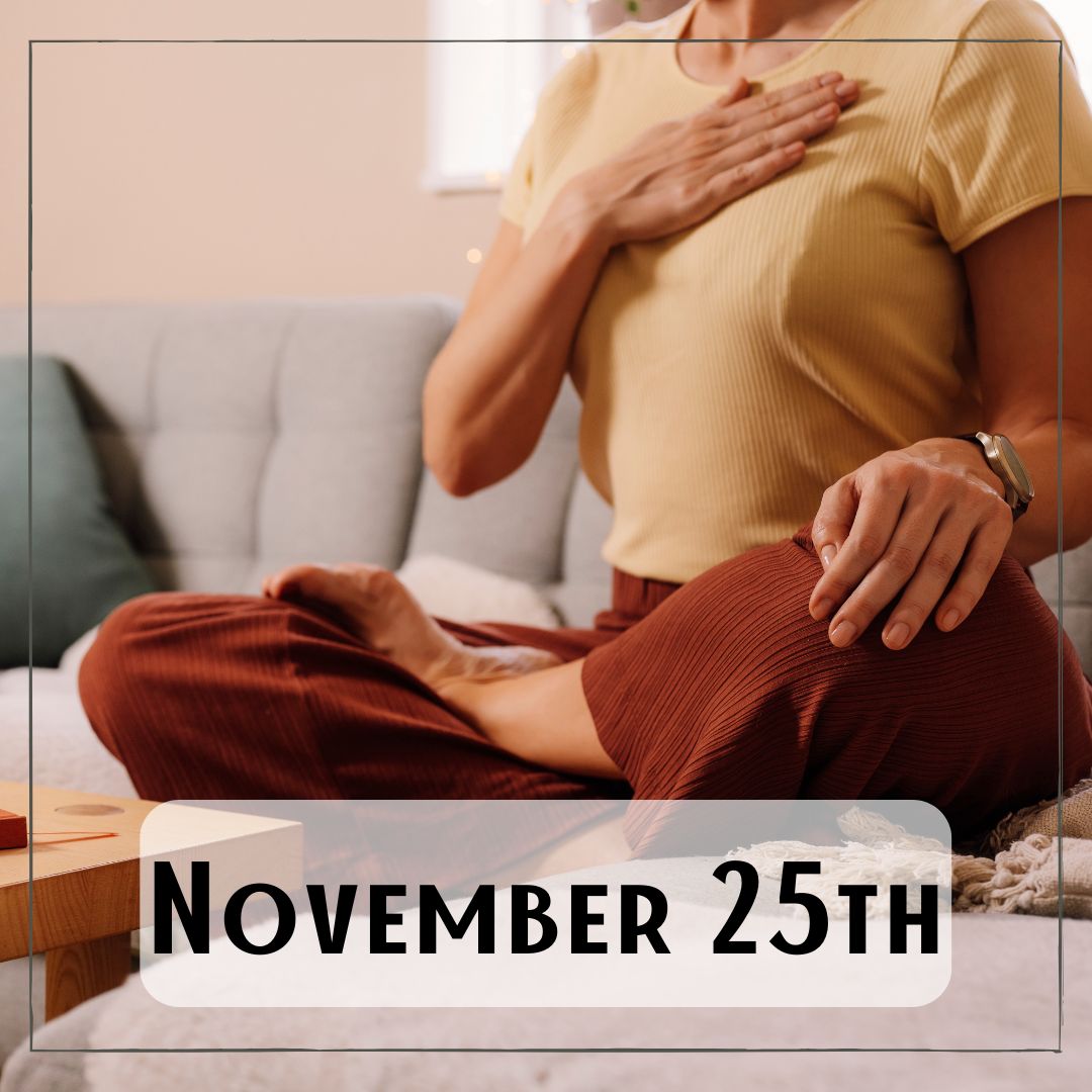 November 25th - a person sitting cross-legged with their hand on their chest