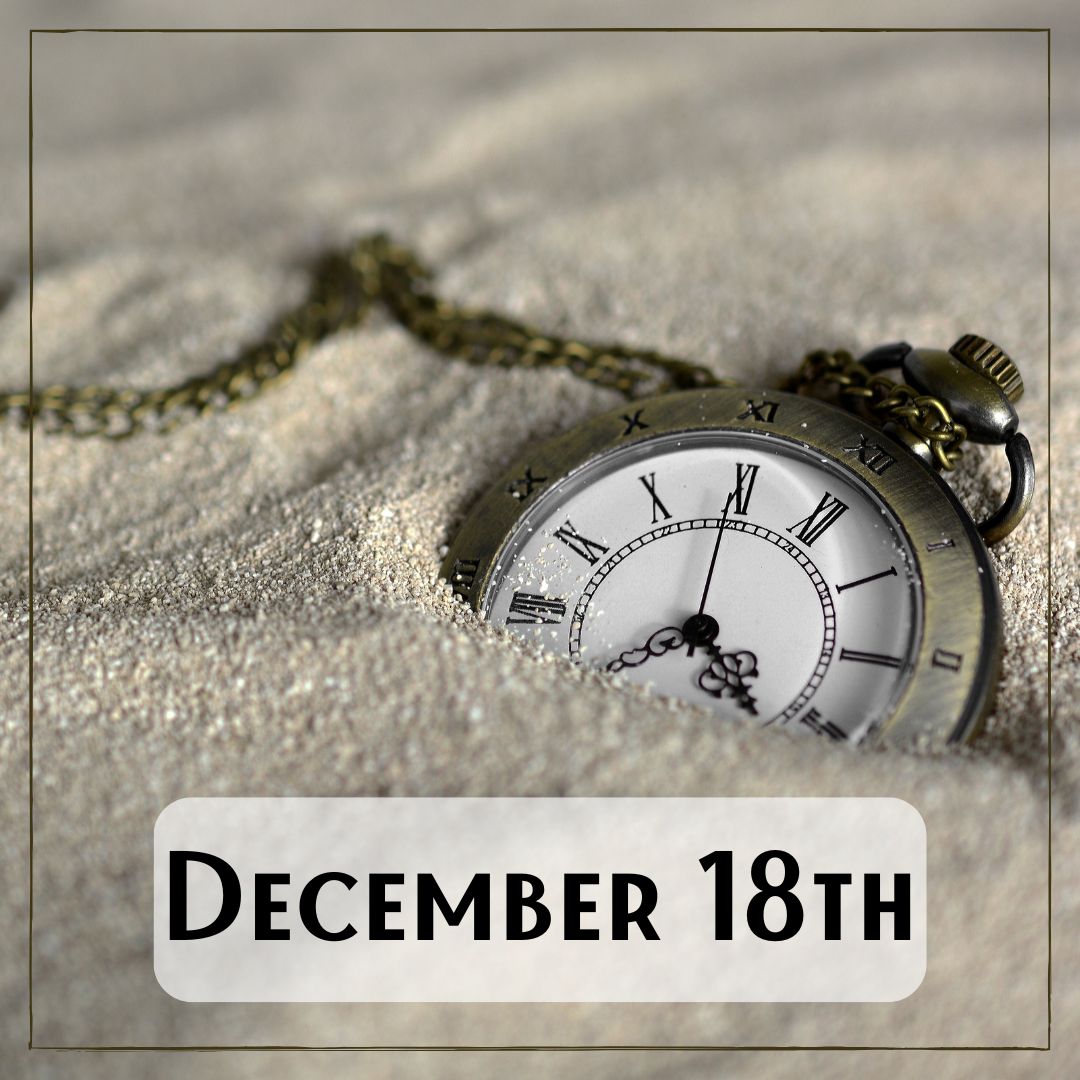December 18th - an old pocket watch half buried in the sand