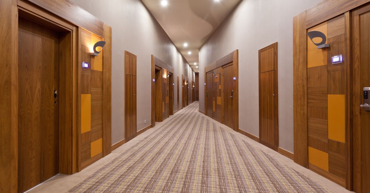 Image: A long hallway of doors