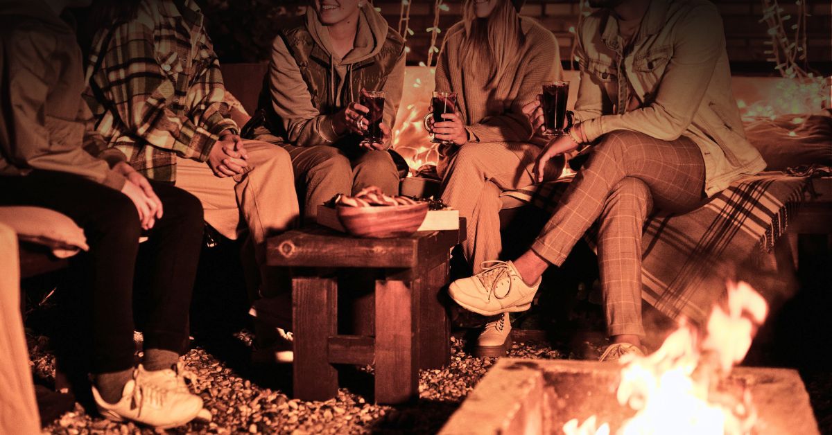 Image: group of friends around a campfire