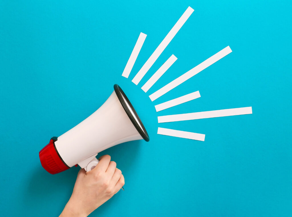 megaphone on cyan background