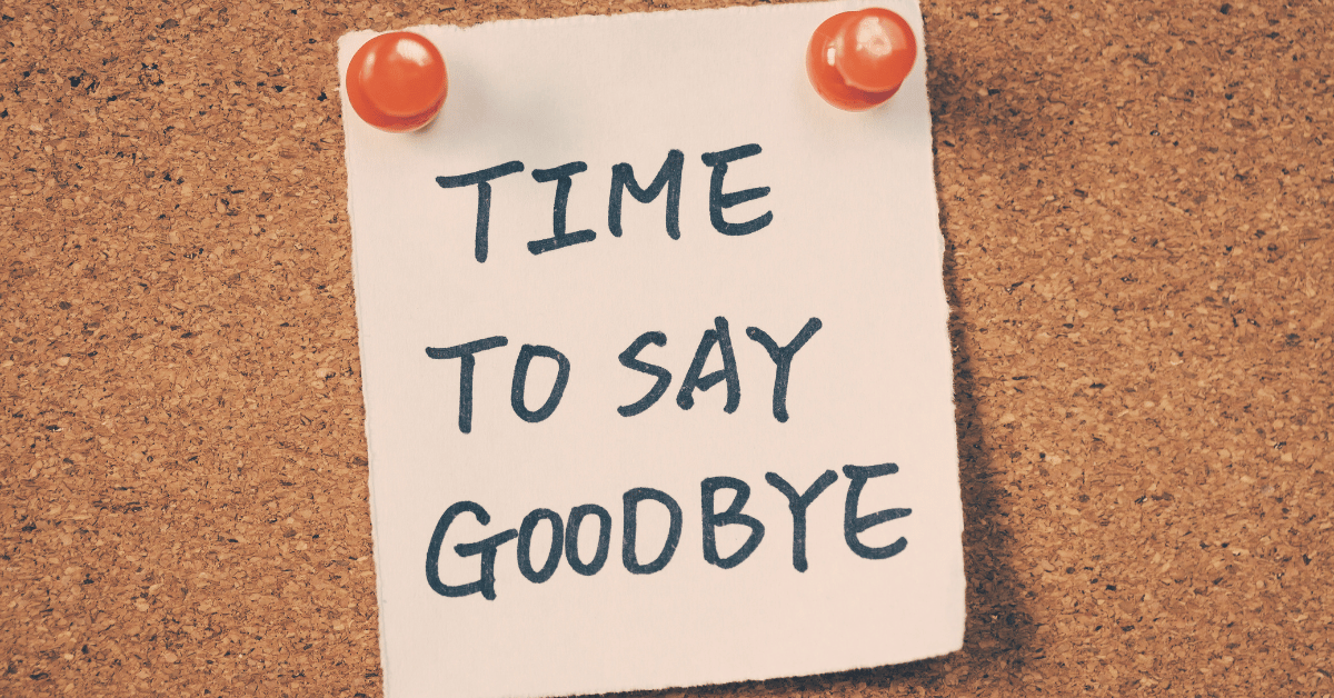 A post it on a corkboard that says "Time to say goodbye"