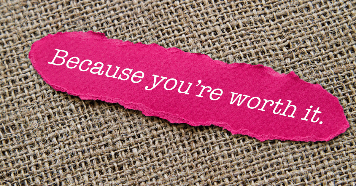 A pink piece of paper that says "Because you're worth it"