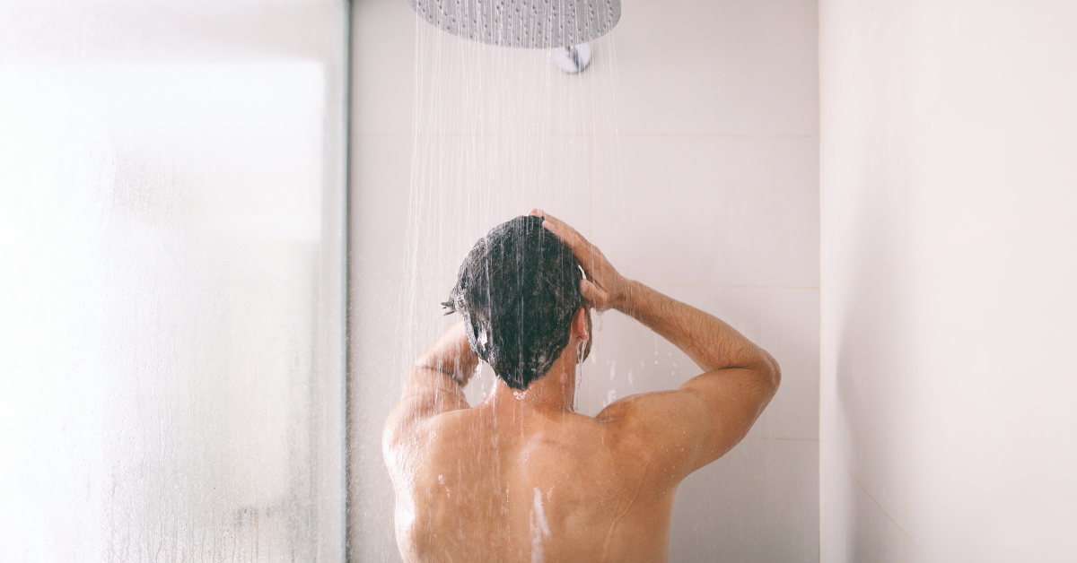 An individual in a shower
